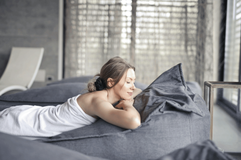 woman in a robe relaxing at a wellness hotel